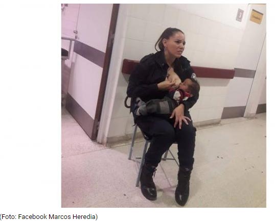 Kadın polis aç kalan bebeği emzirdi - Resim : 1