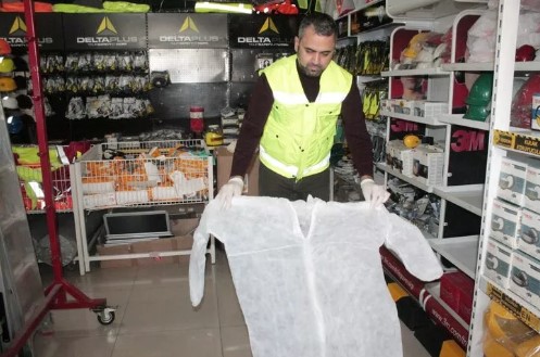 Tek kullanımlık tulum 3 liradan 120 liraya çıktı - Resim : 1