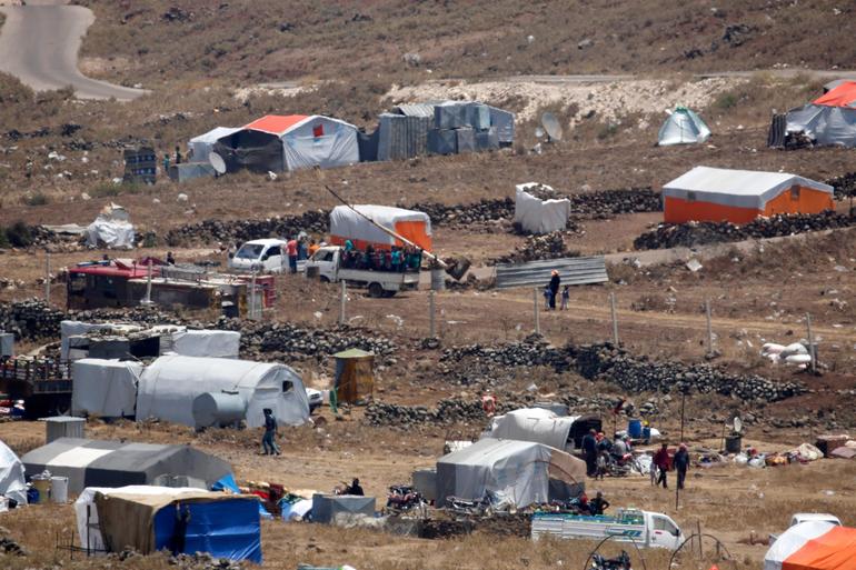 Esad'dan kaçan Suriyeliler İsrail sınırına dayandı - Resim : 3